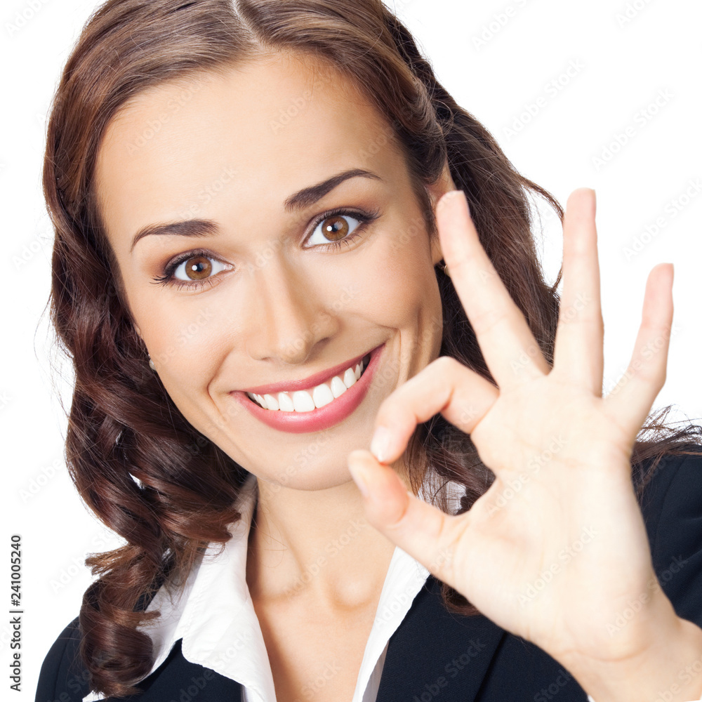 Businesswoman with okay gesture, isolated Businesswoman with okay gesture, isolated