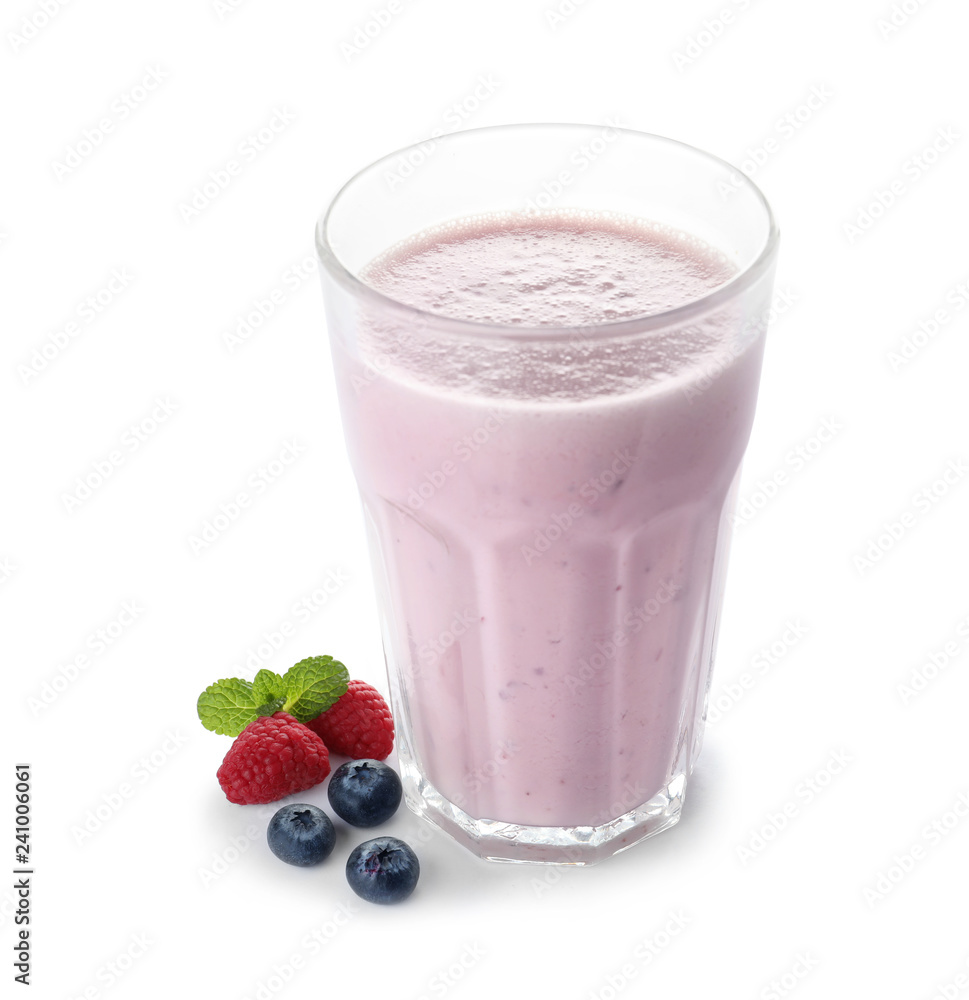 Glass of protein shake and berries isolated on white Glass of protein shake and berries isolated on white
