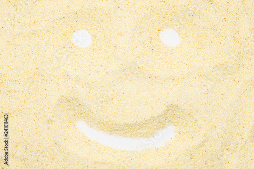 Semolina, funny smile face, close up, macro, top view. Popular flour in cooking. Used for making of pasta or couscous or as baby food. photo
