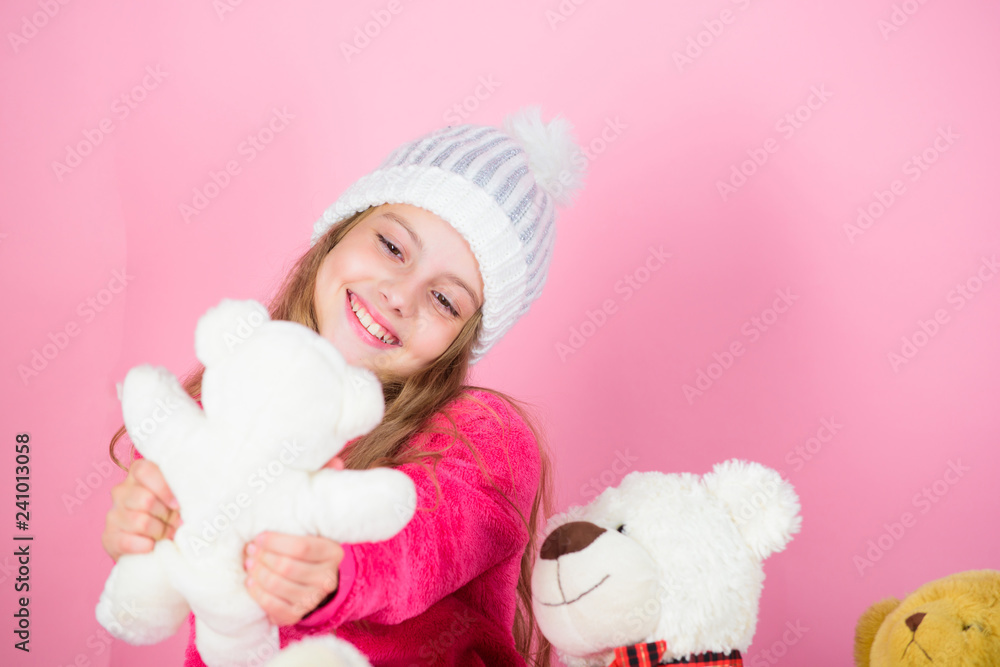 Why kids love stuffed animals. Toy every child dreaming. Kid little girl play with soft toy teddy bear on pink background. Happy childhood concept. Child small girl playful hold teddy bear plush toy Why kids love stuffed animals. Toy every child dreaming. Kid little girl play with soft toy teddy bear on pink background. Happy childhood concept. Child small girl playful hold teddy bear plush toy