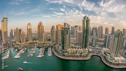 Beautiful aerial top view at sunset timelapse of Dubai Marina in Dubai, UAE © neiezhmakov