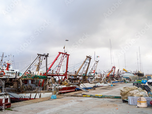 Fishing boats moored at the port quay