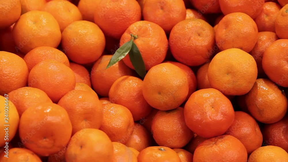 Bunch of fresh mandarin oranges on market Bunch of fresh mandarin oranges on market