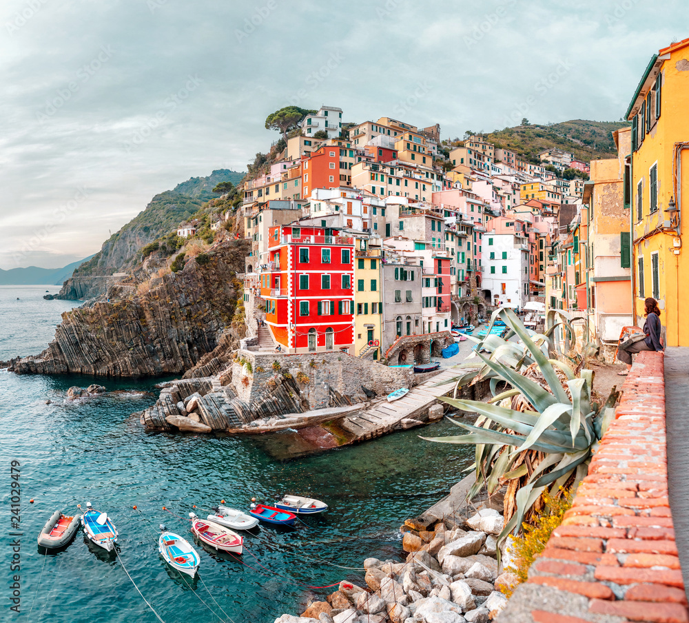 Panoramic view of Riomaggiore fishing town in Cinque terre nature park. Travel and vacation destination in Italy and Europe