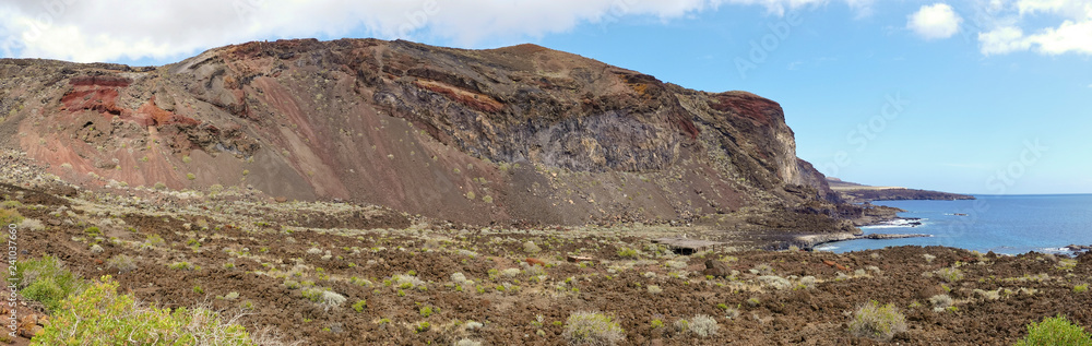 The colorful rocks at the coastline of El Hierro near Tacoron. Canary Islands. Spain. The colorful rocks at the coastline of El Hierro near Tacoron. Canary Islands. Spain.
