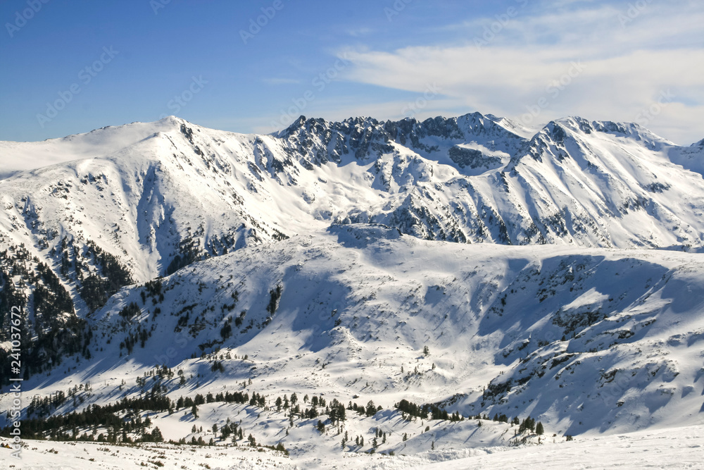 Winter landscape with hills covered with snow at Pirin Mountain, view from Todorka peak, Bulgaria Winter landscape with hills covered with snow at Pirin Mountain, view from Todorka peak, Bulgaria
