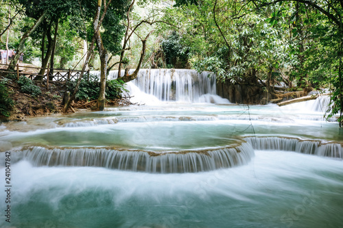 The Kuang Si Falls  sometimes spelled Kuang Xi or known as Tat Kuang Si Waterfalls  a three levelled waterfall south of Luang Prabang  Laos