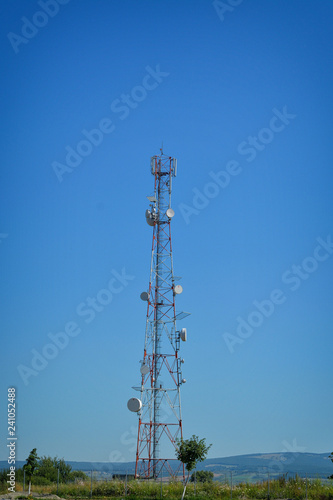 Telecommunications tower.Image contain certain grain or noise and soft focus.