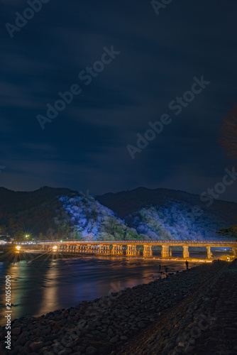 the illuminated bridge Togetsu-kyo in Arashiyama, Kyoto, Japan.