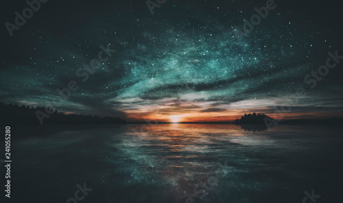Stars reflected in the water of the archipelago during sunset photo