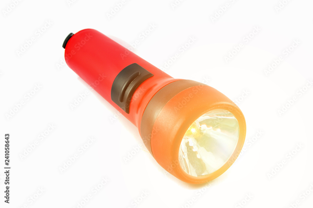 flashlight isolated With orange lights / Red torch light on white background flashlight isolated With orange lights / Red torch light on white background