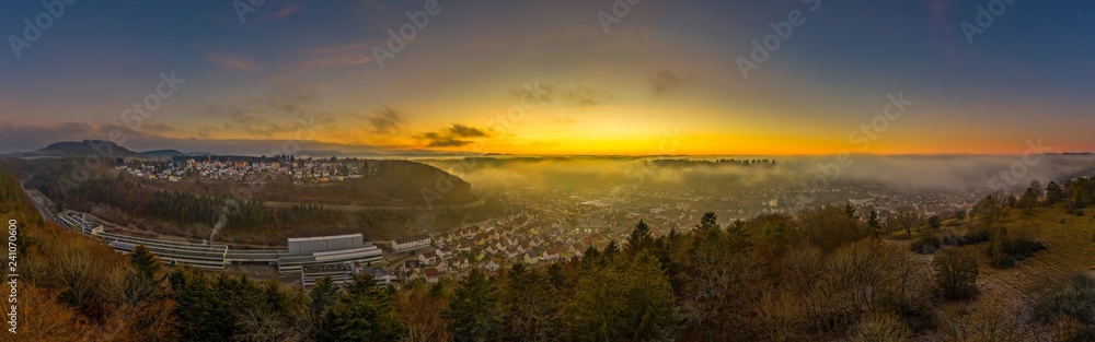 Die Schwäbische Alb im Nebel bei untergehender Sonne - Luftaufnahme/Aerial von Albstadt