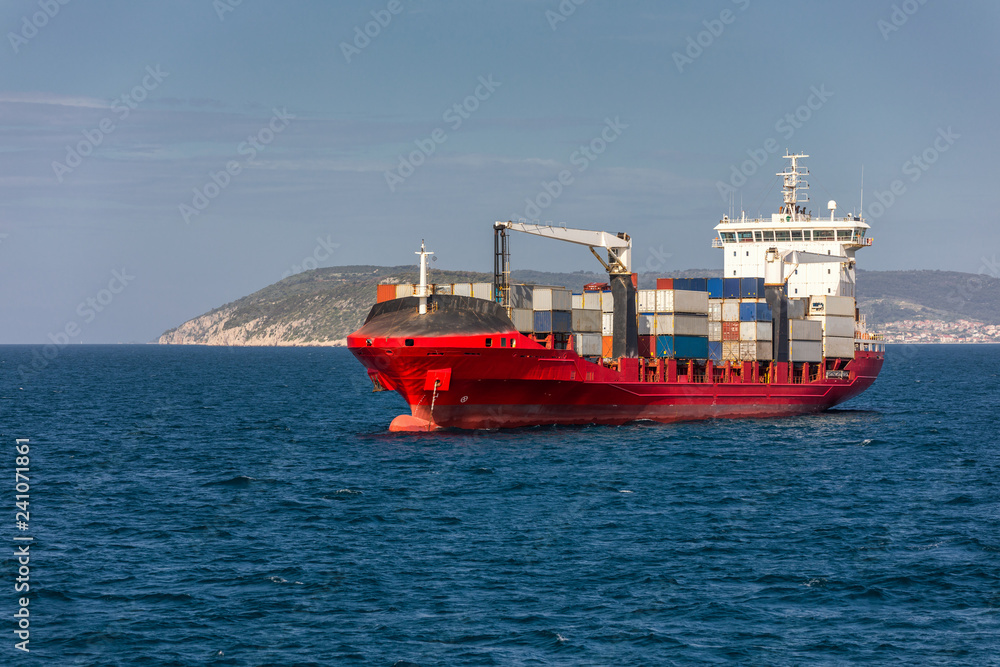 Logistics and transportation of International Container Cargo ship in the sea. International Container Cargo ship in the ocean, Freight Transportation, Shipping, Nautical Vessel.