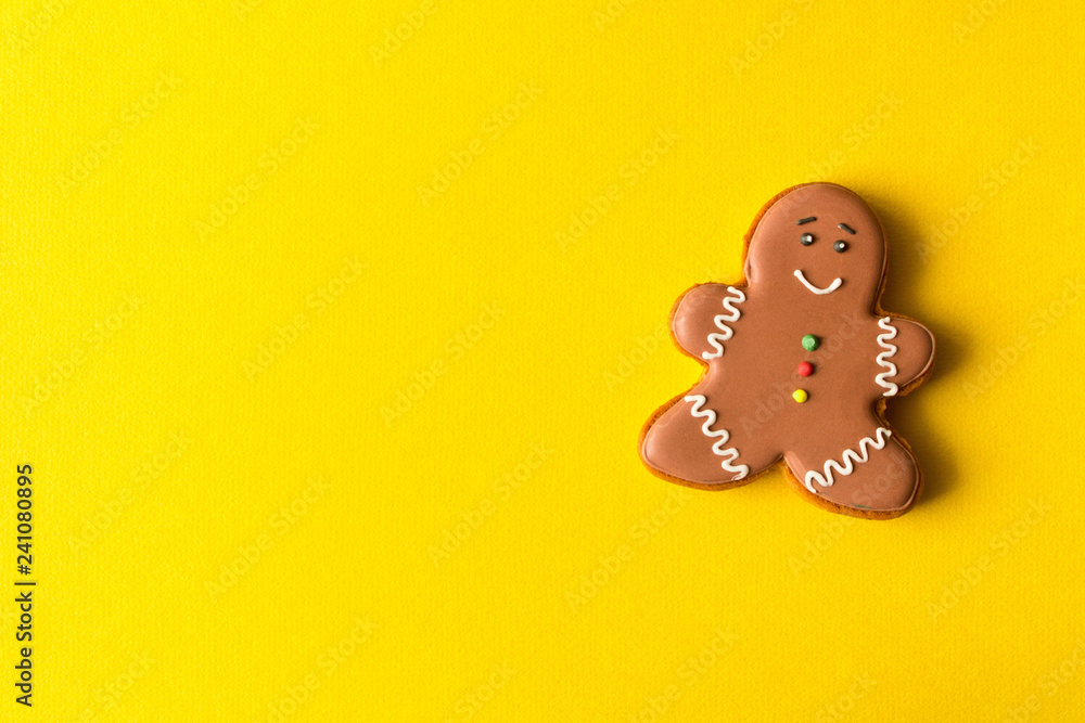 Funny gingerbread man on yellow background. Funny gingerbread man on yellow background.