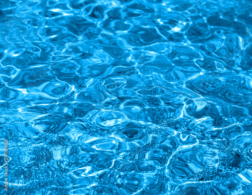 Photo macro Background blue transparent water with waves © tanor27