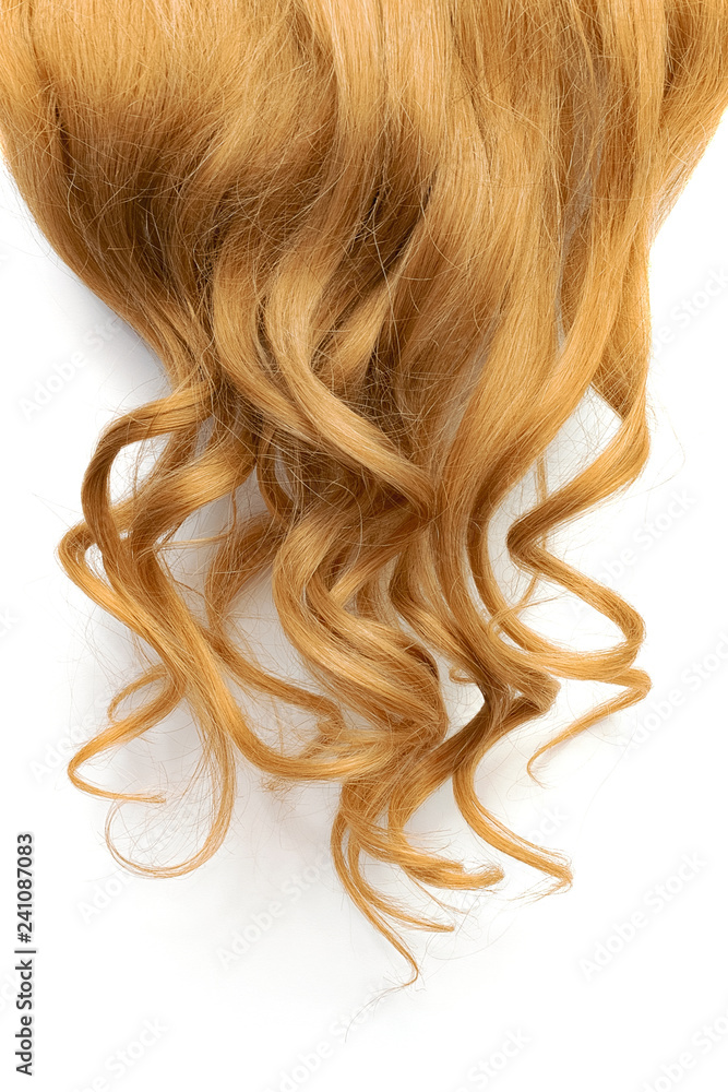 Natural wavy brown hair on white background Natural wavy brown hair on white background