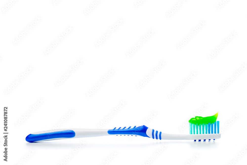 toothbrush and toothpaste on an isolated background toothbrush and toothpaste on an isolated background