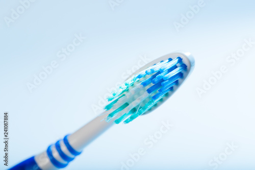 toothbrush on an blue background  close up