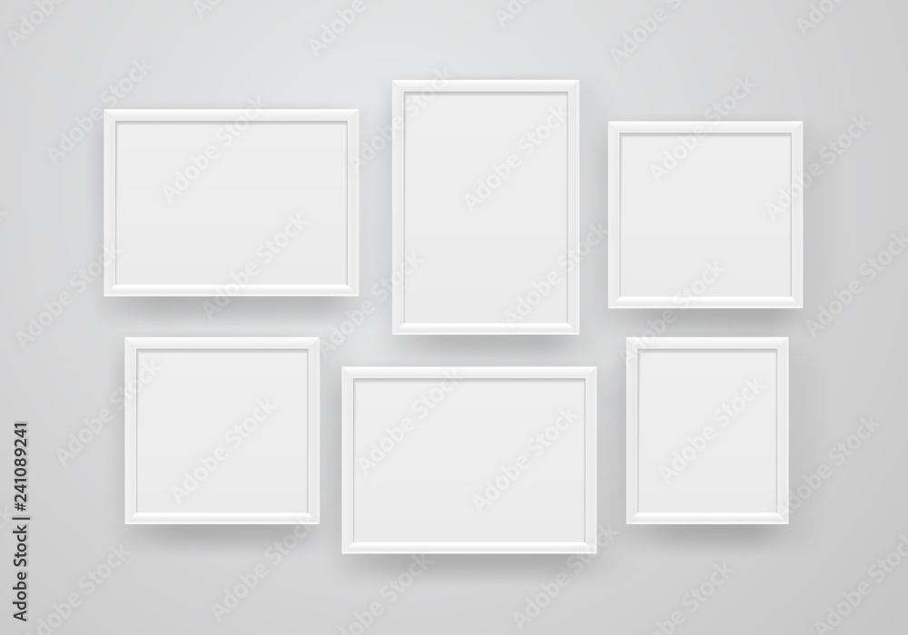 Empty white frames on a wall. Vector illustration Empty white frames on a wall. Vector illustration