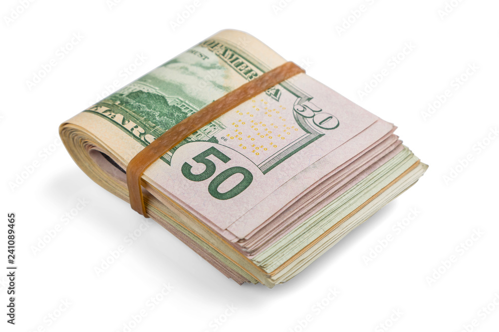 stack of cash dollars, bent in half, under the elastic band is isolated on a white background. Close-up. stack of cash dollars, bent in half, under the elastic band is isolated on a white background. Close-up.