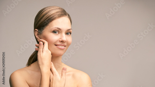 Beauty natural portrait. Facial skincare model. Fresh elegant women face. Cosmetology treatment