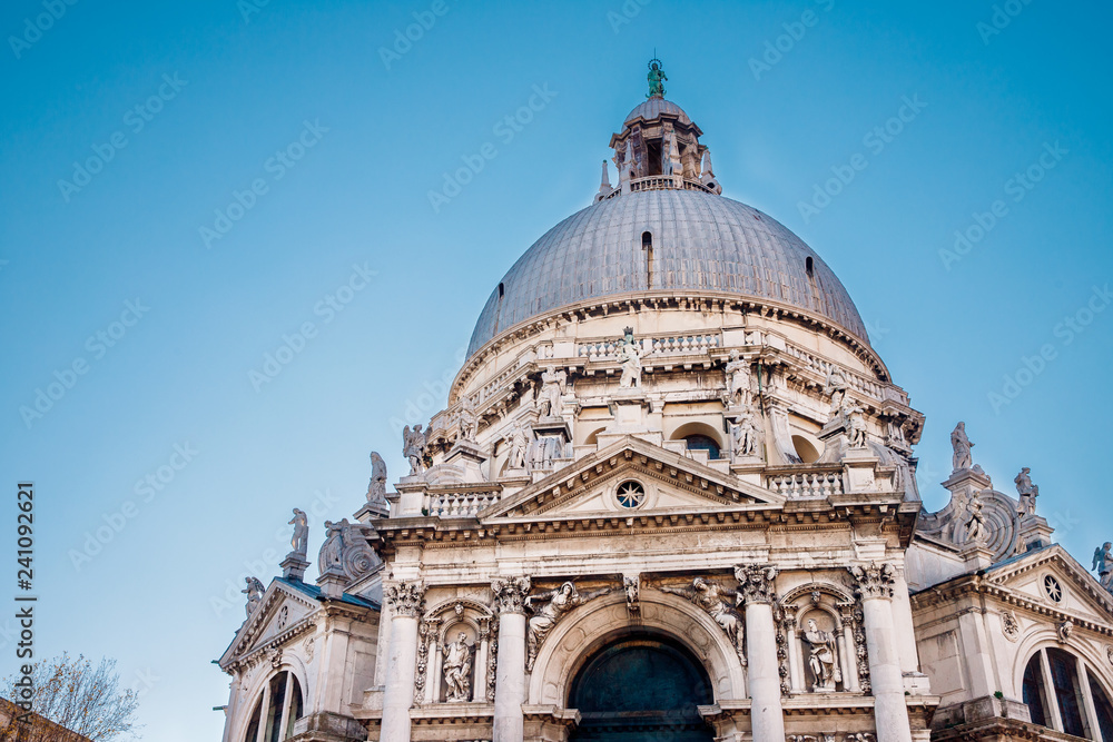 Cathedral of Santa Maria della Salute. Ffacade is decorated with sculptures of Archangel Michael beating Satan