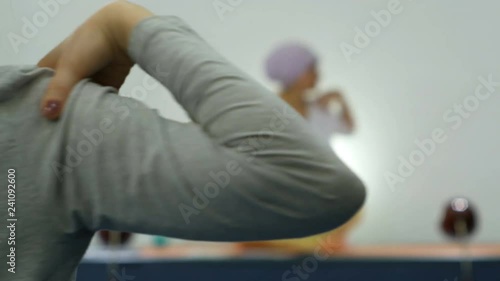 A group of women doing kundalini yoga