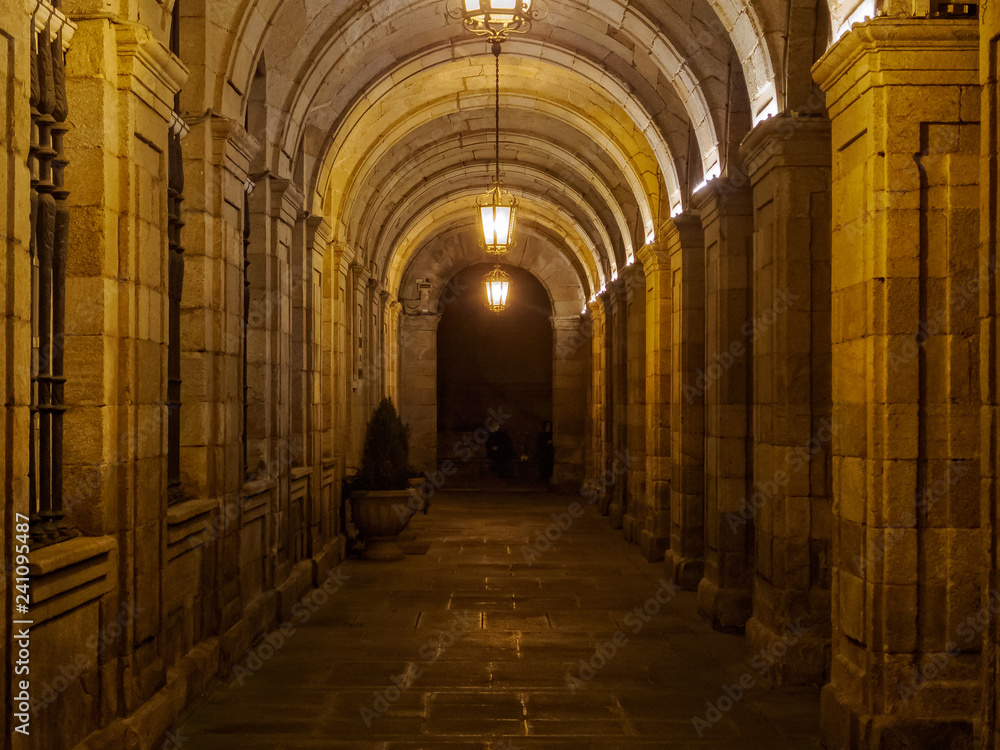 Fototapeta premium Arcade of the Raxoi Palace in dim light - Santiago de Compostela, Galicia, Spain