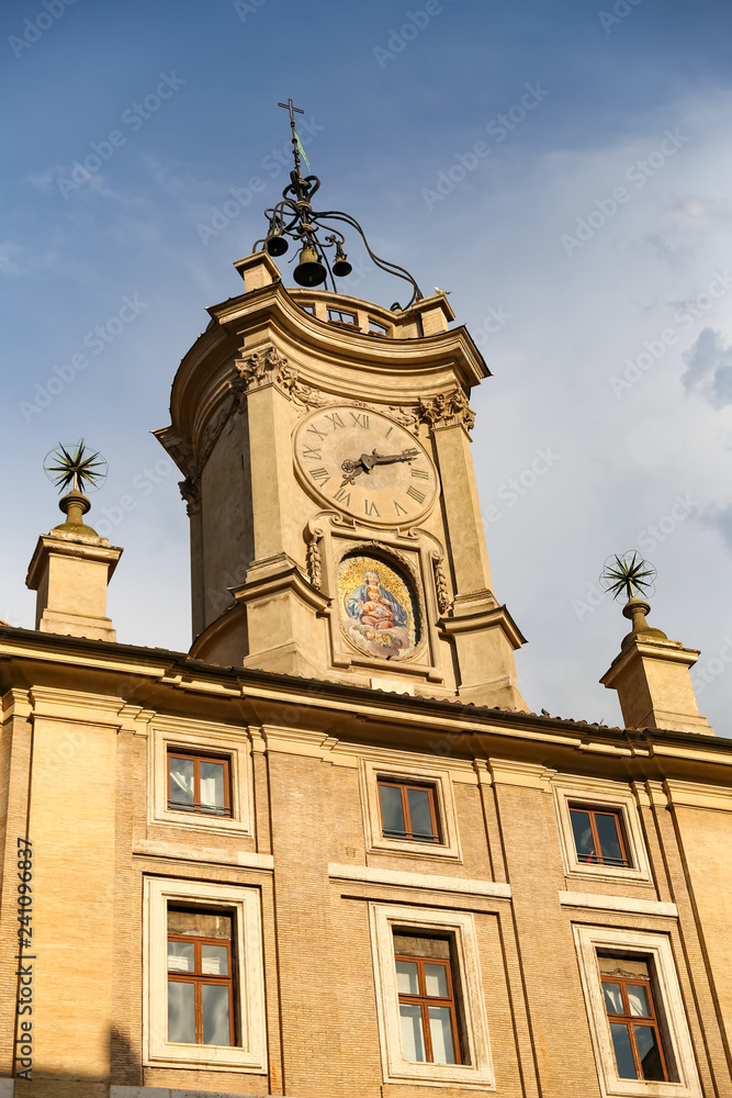 Clock Tower over a Building in Rome, Italy