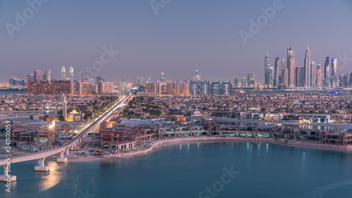 Jumeirah Palm island skyline day to night timelapse in Dubai  UAE.