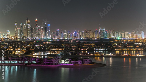 Jumeirah Palm island skyline night timelapse in Dubai, UAE. © neiezhmakov