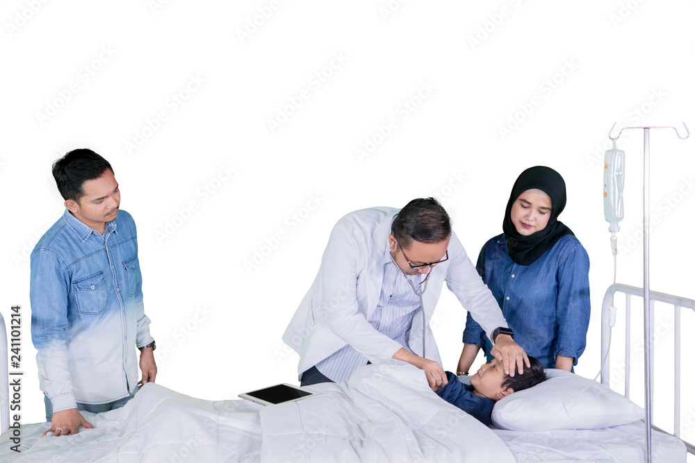 Asian pediatrician examining his patient on studio Asian pediatrician examining his patient on studio