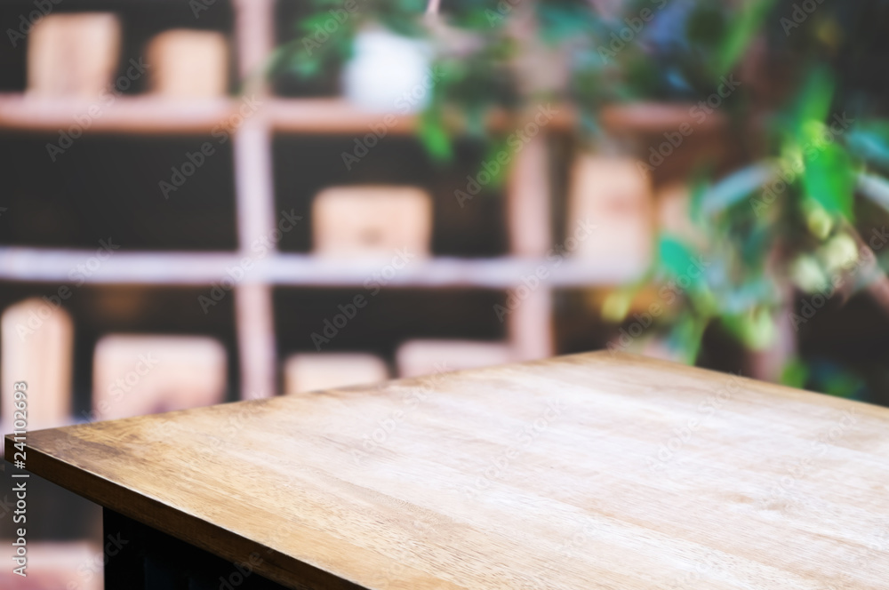 empty wooden desk over blurred interior decoration background empty wooden desk over blurred interior decoration background
