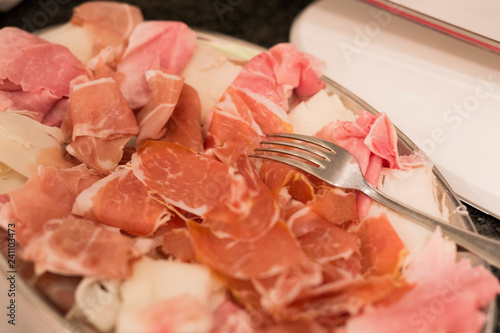 Wallpaper Mural horizontal image with detail of typical Italian products, salami ham, bacon, served on a tray Torontodigital.ca