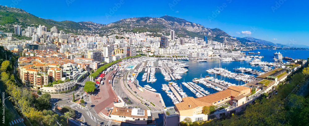 Aerial panoramic view over Monaco city, Generic architecture around seaside and famous port in summer holiday