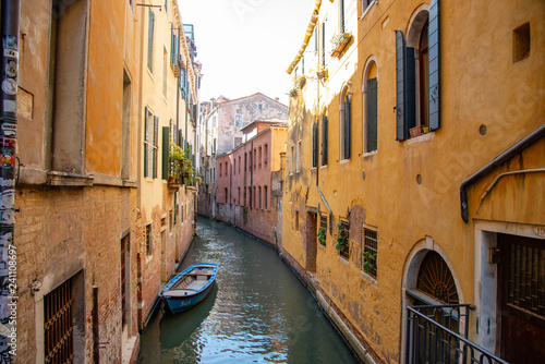 View on a canal, Venice, Italy. Detail on Venetian houses and boats.