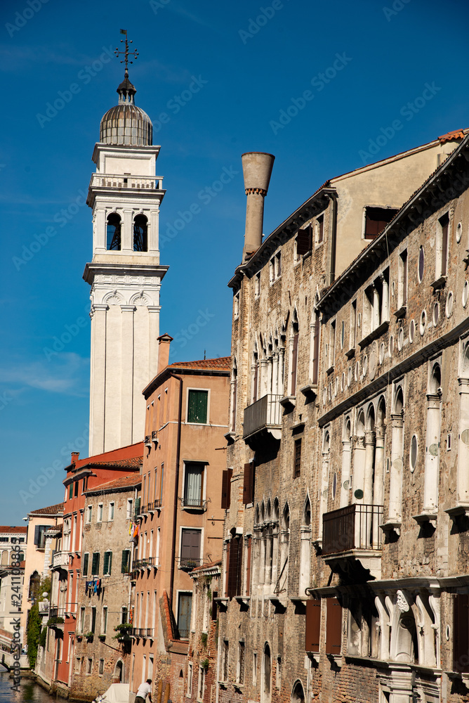 Typical houses in Venice, Italy, with bell chimneys or inverted truncated cone. Overlooking the Grand Canal, the main town water communication route