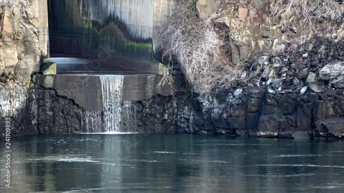 Waterfall flowing from drain at the Dalles Dam photo