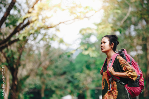 Traveler backpacker asian woman with nature background , concept travel , copy space