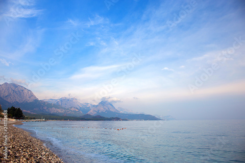 Sea landscape  coast of the Mediterranean Sea  View of mountains  pebble beach