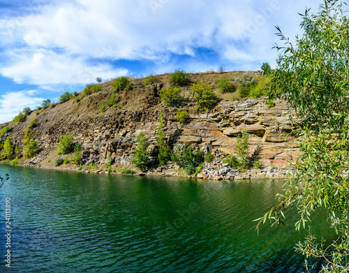 Obraz na płótnie Clean pond on the site of a flooded stone quarry near Makeyevka in Donbass 4