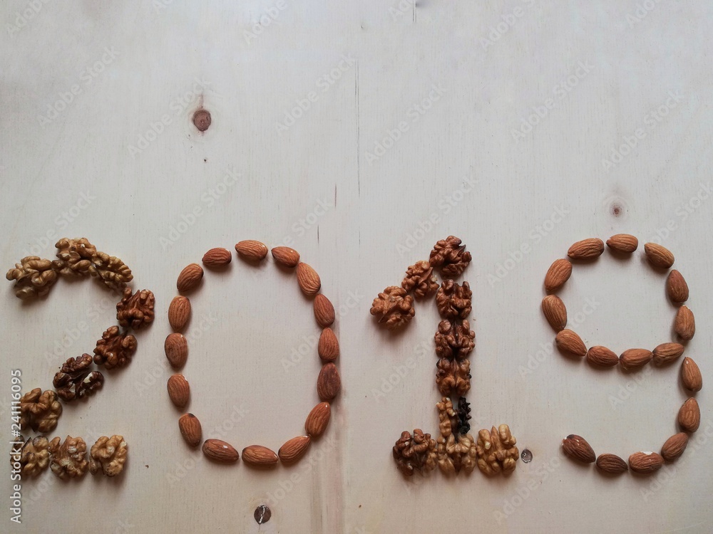 Written 2019 with walnuts and almonds Written 2019 with walnuts and almonds