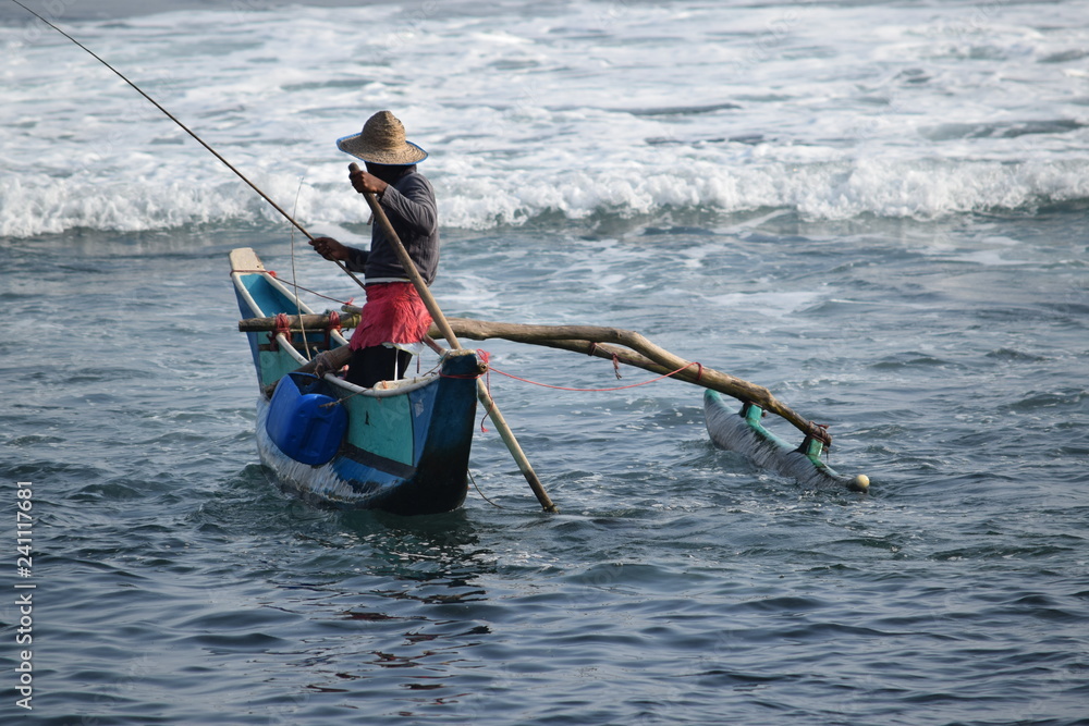 Naklejka premium Fishing Down Southof Sri Lanka