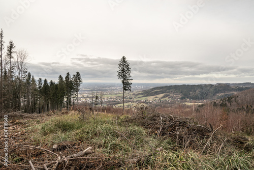view from Javorovy hill above Bystrice nad Olsi vullage in autumn Slezske Beskydy mountains in Czech republic photo