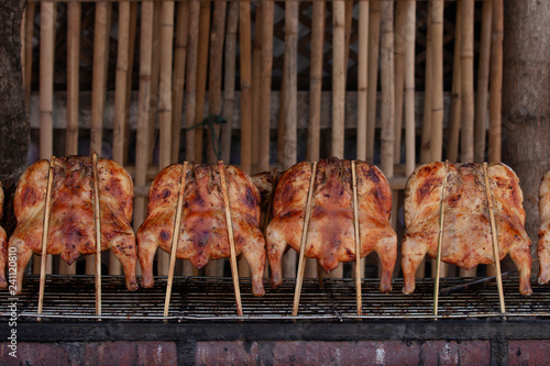 Chicken Grilled in a traditional style, Local foods of Thailand This name is 