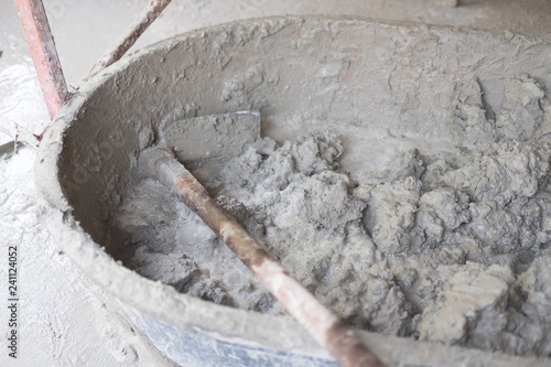 Bucket cement mix with on construction site
