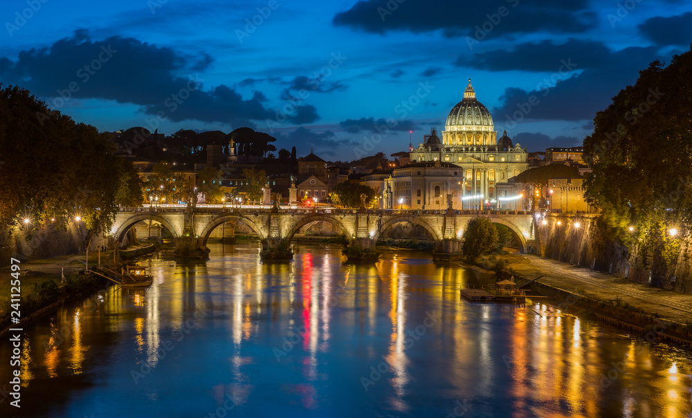Rome skyline in a summer evening, as seen from Umberto I bridge, with Saint Peter Basilica in the background.