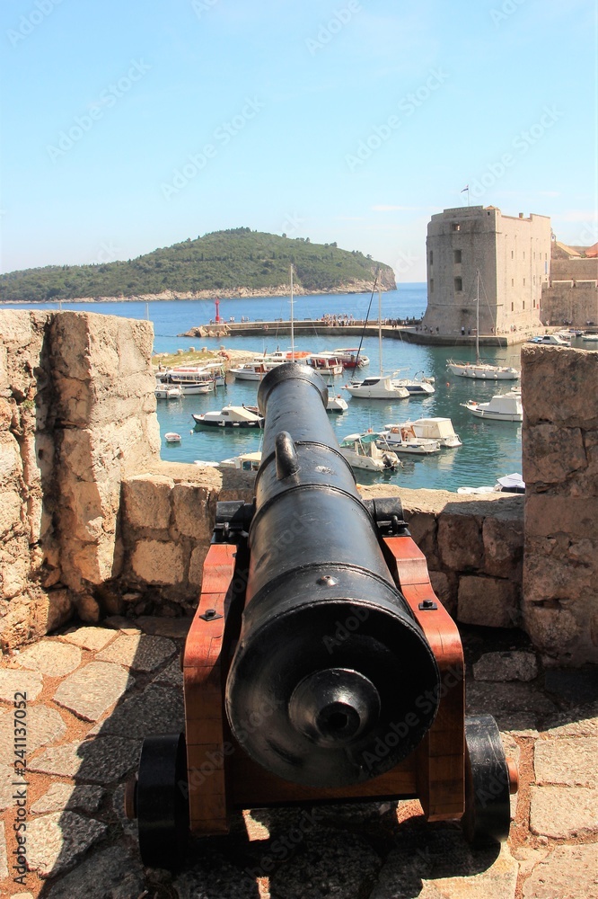 Cast-iron cannon and saw the harbor of Dubrovnik, Croatia.