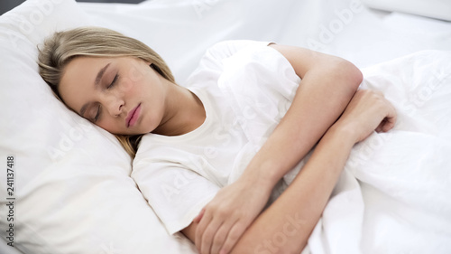 Sick patient sleeping on hospitals bed, recreational dream, health care, resting