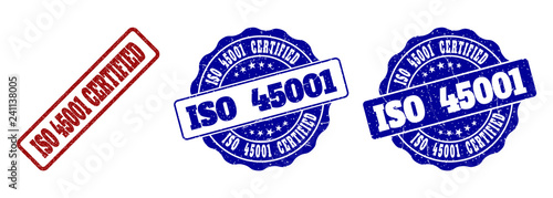 ISO 45001 CERTIFIED grunge stamp seals in red and blue colors. Vector ISO 45001 CERTIFIED marks with dirty style. Graphic elements are rounded rectangles, rosettes, circles and text captions.